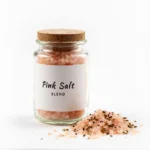 pink himalayan salt in bowl on white background