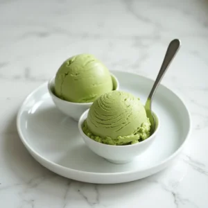 matcha ice cream scooped and served in modern dish