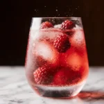 raspberry popping pearls in iced drink