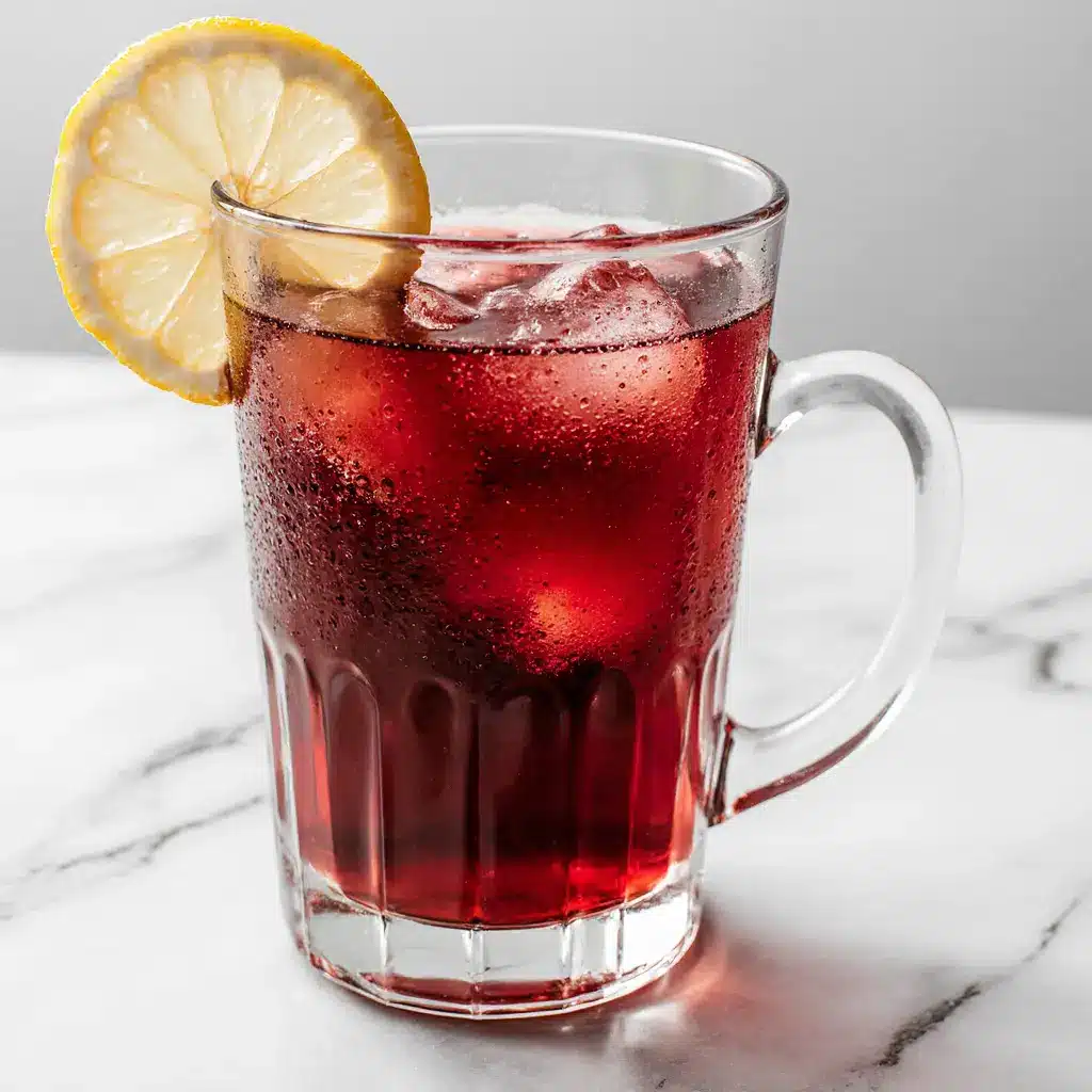 sparkling tea health in a glass with lemon