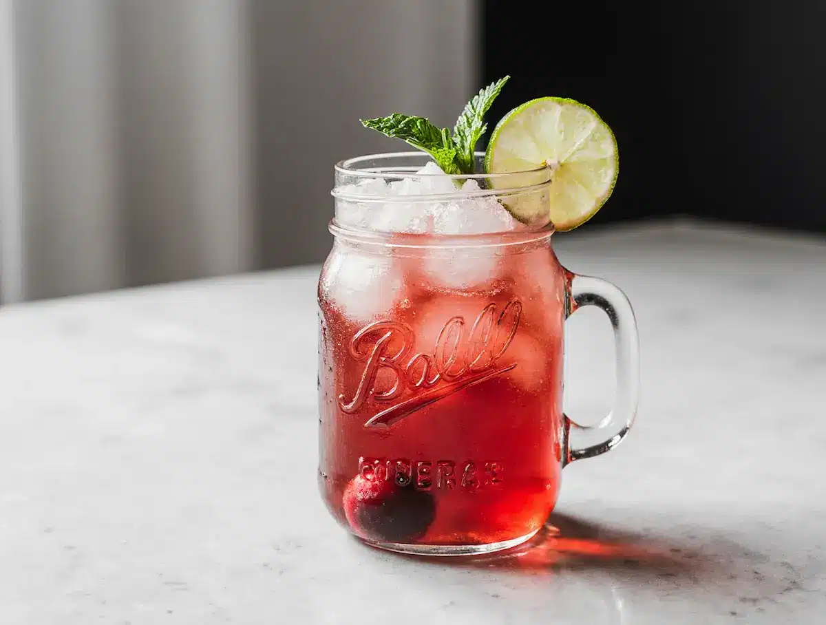 cherry limeade mocktail on kitchen counter