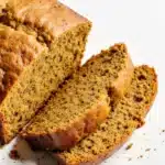 Moist golden Libby's Pumpkin Bread loaf with visible warm autumn spices