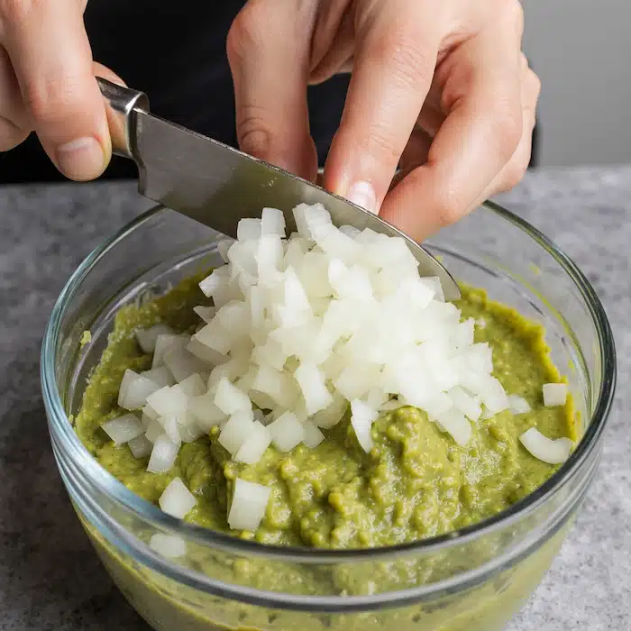 Dicing white onion for guacamole