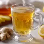 Canaan Honey Trick for Memory, Eyes & Weight Loss: Honest Recipe, Real Benefits, and Hidden Myths 3 close up of canaan honey trick drink in glass with lemon and ginger on light background