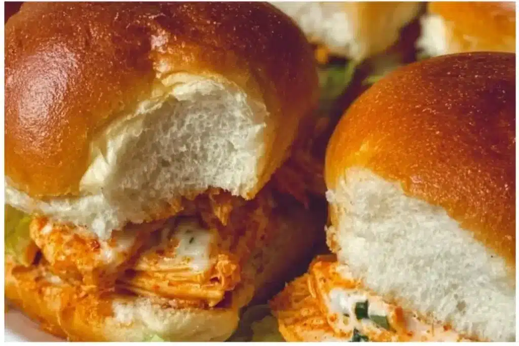 Spicy Buffalo Chicken Sliders 1 Delicious spicy Buffalo chicken sliders served on a platter