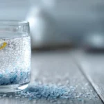 Blue Horse Salt Trick for Men: The Ultimate Guide to the Viral "Horse Salt" Trend, Recipe & Benefits 3 Glass of warm water with dissolved Persian blue salt and a lemon wedge representing the blue horse salt trick drink