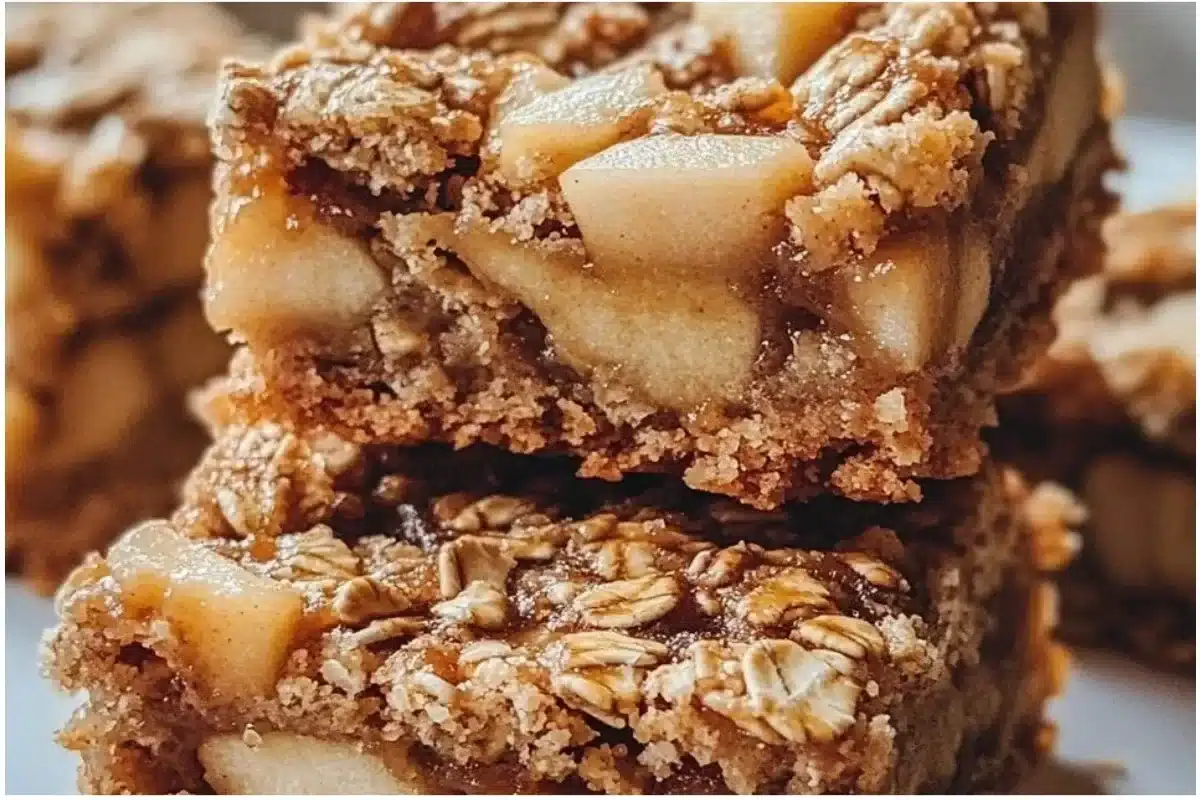 Delicious caramel apple oatmeal cookie bars with a golden brown finish.