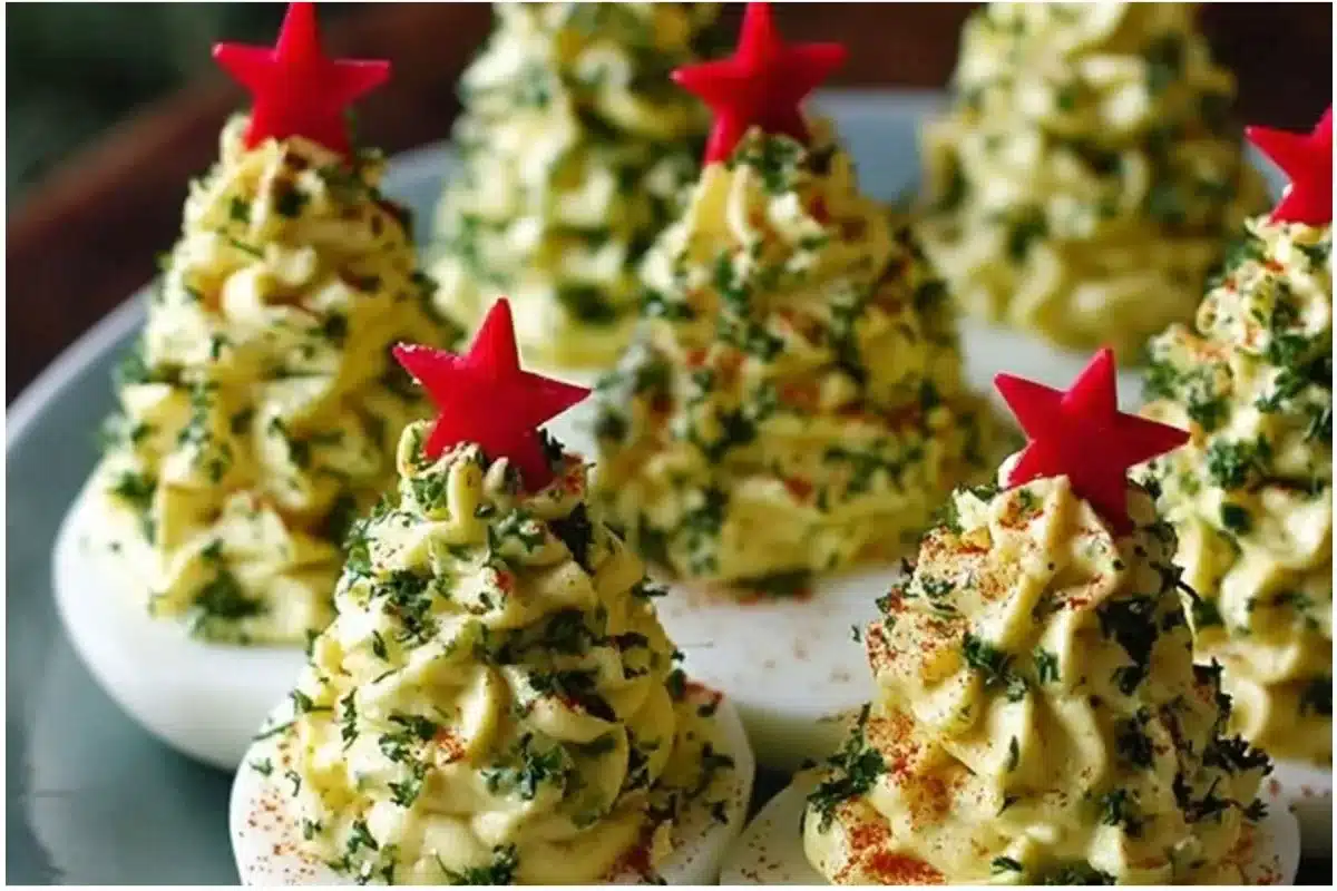 Deviled eggs arranged as Christmas trees for a festive holiday appetizer
