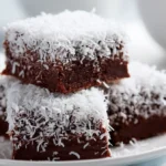 The Ultimate Lamington Recipe Guide: Tricks, Tips, and Secrets for Perfect Results Every Time 5 lamington recipe chocolate coating with coconut texture close up