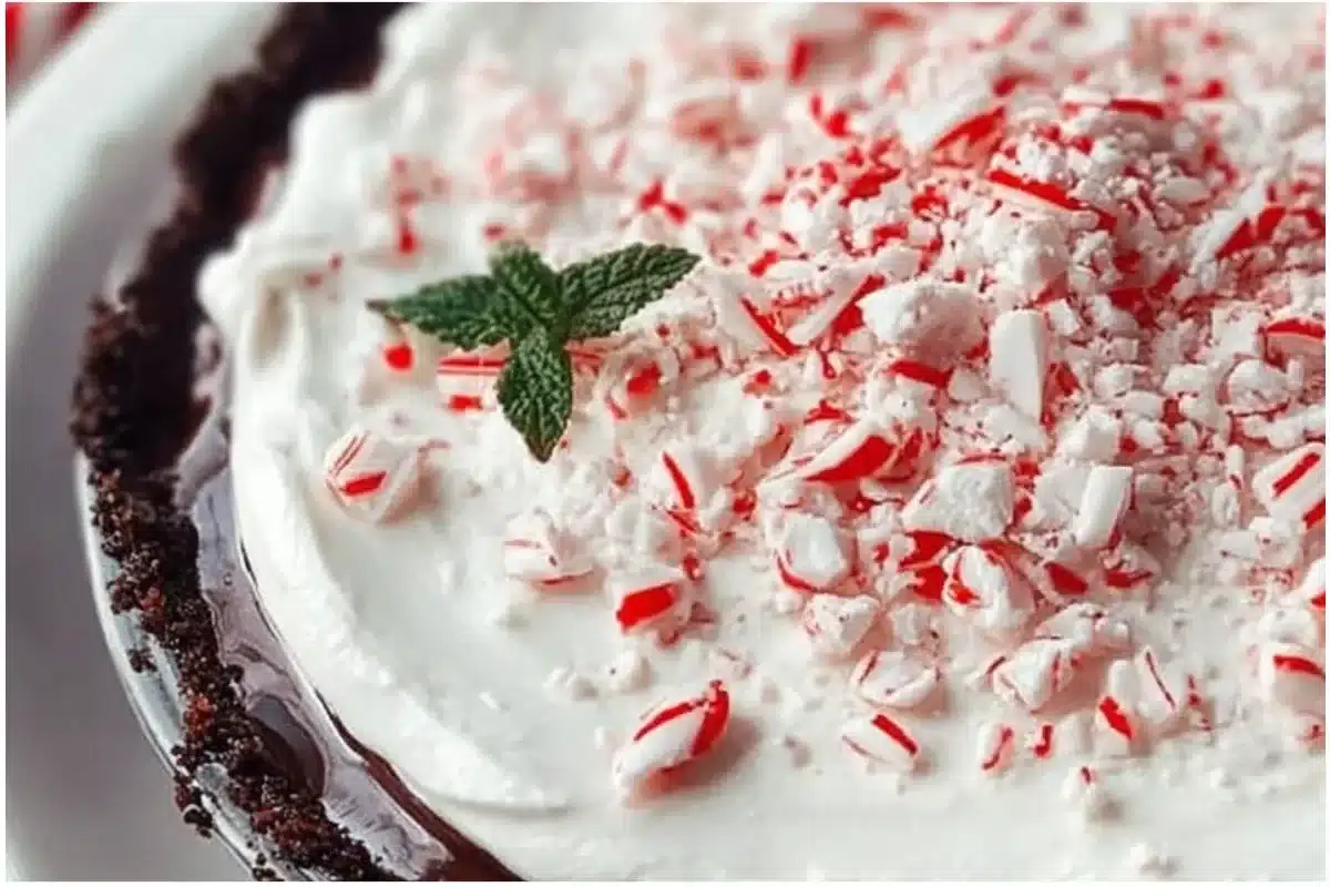 Quick Christmas Peppermint Pie garnished with whipped cream and chocolate