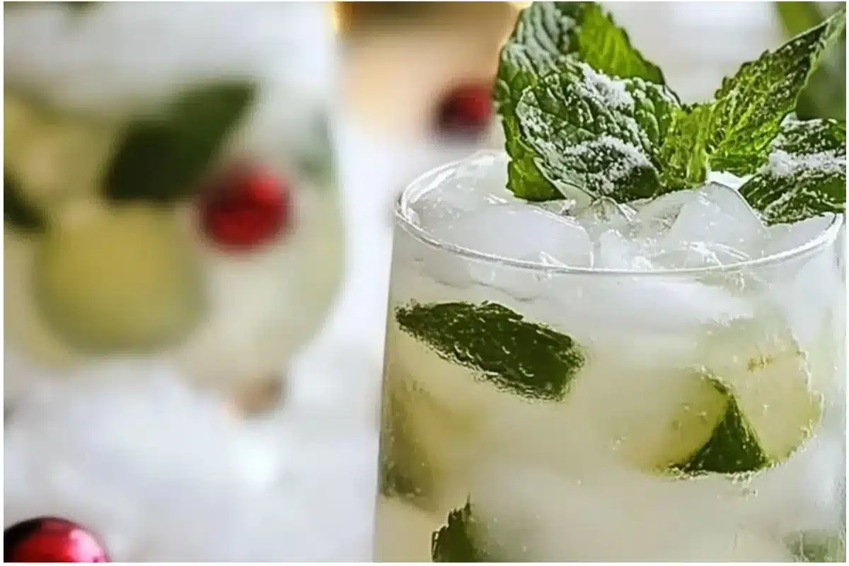 Refreshing White Christmas Mojitos served in a festive glass