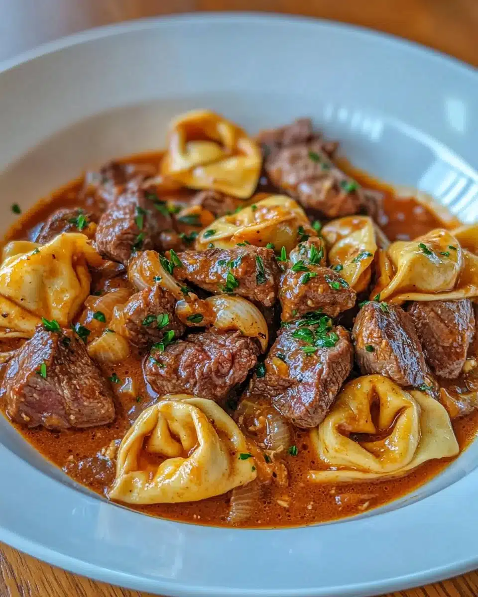 Delicious cracked garlic steak tortellini served in creamy sauce