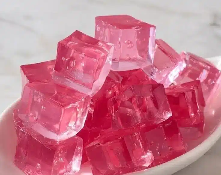 Colorful pink gelatin dessert showcasing the gelatin trick for fun recipes