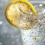 tadpole water recipe showing chia seeds soaked in clear glass with lemon creating gel-like tadpole appearance for weight loss