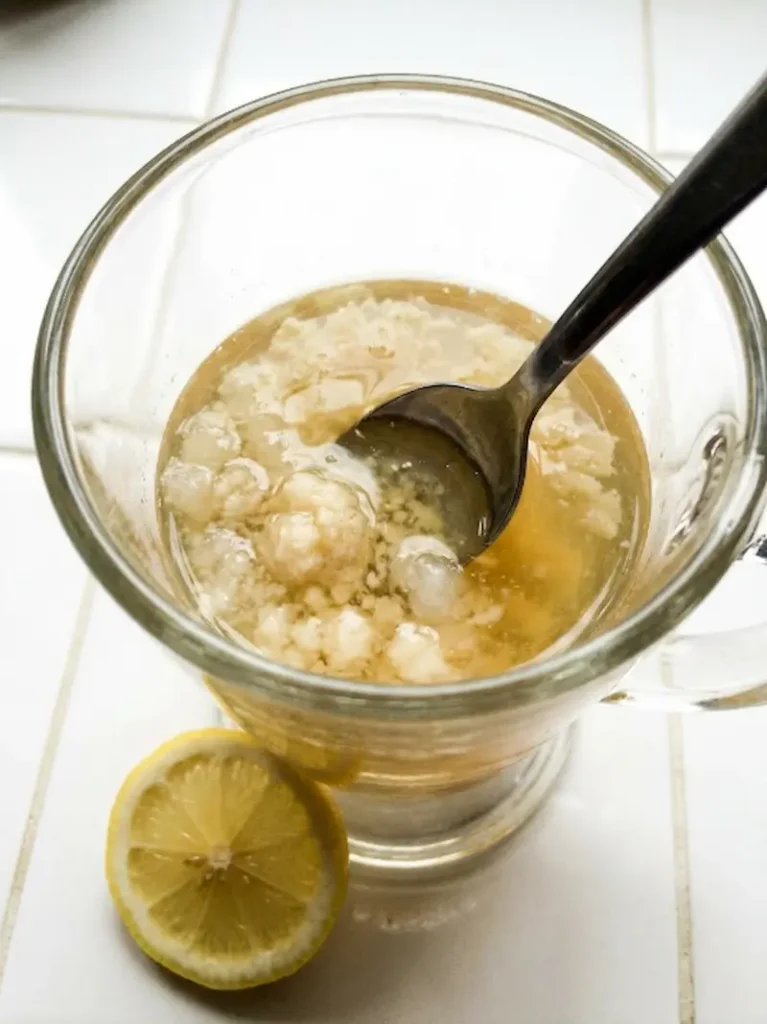 finished serena williams gelatin trick drink in clear glass mug ready to serve