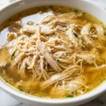 1 Proven Ozempic Nausea Recipe: Calm Your Stomach Today 3 Close-up of clear ginger chicken broth, a perfect Ozempic nausea recipe.